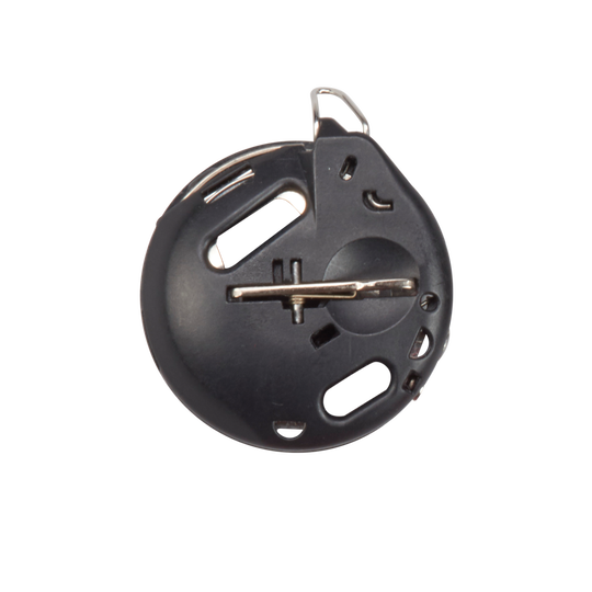 BERNINA hook bobbin case shown from the front, round dark housing with metal latch and thread guides for precise sewing machine stitching image number